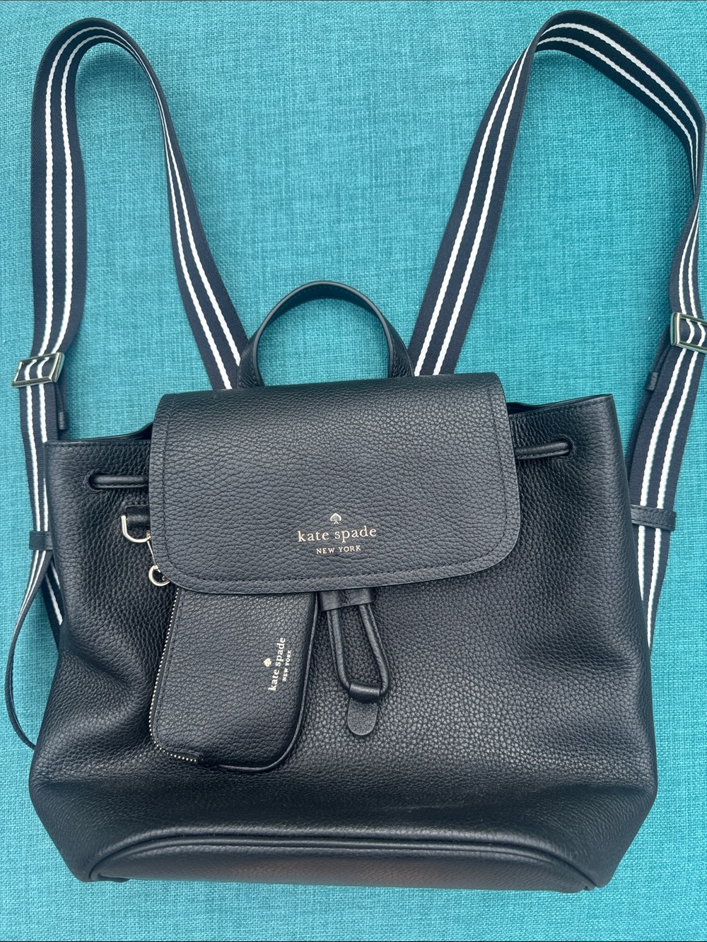 kate spade black pebbled leather drawstring backpack with striped straps